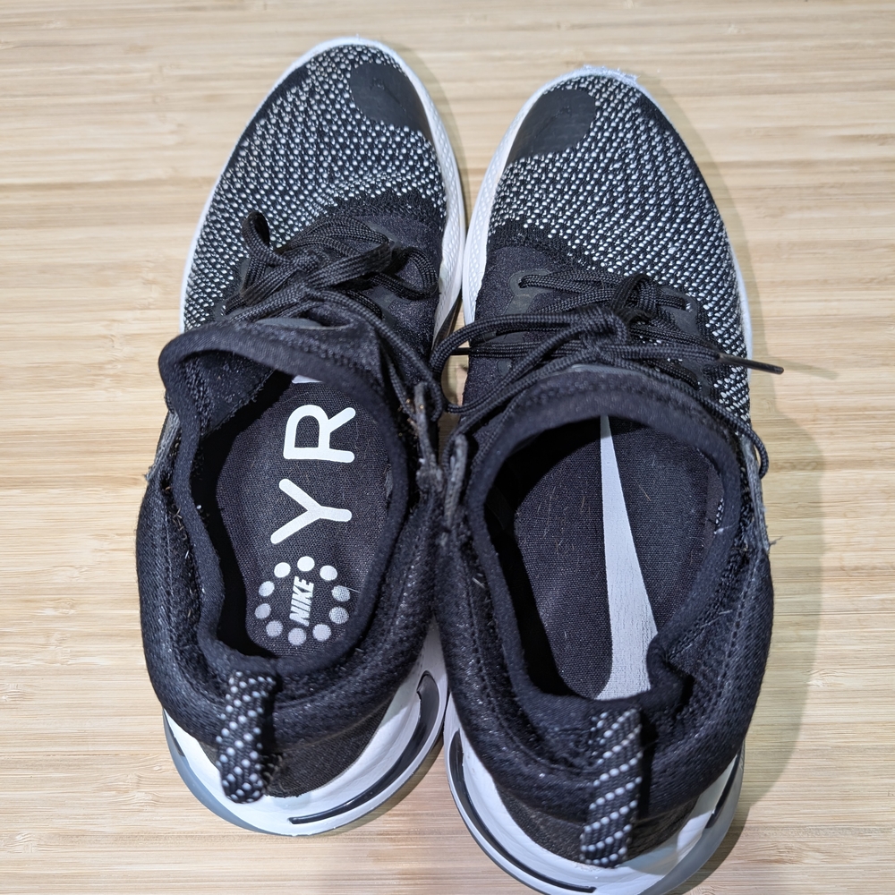 Nike Black and White Sneakers with Mesh Upper and Sock-Like Collar